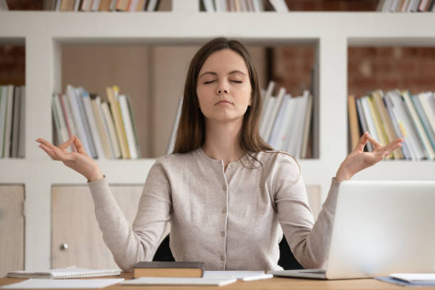 istock Student girl resting from study do yoga practice reaching harmony 1187643104