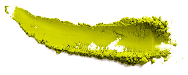 Smear shape made of Matcha Green Tea isolated on white background. Top view. Matcha superfood concept. Design template. Smear shape made of Matcha Green Tea isolated on white background. Top view. Matcha superfood concept. Design template. green tea powder stock pictures, royalty-free photos & images