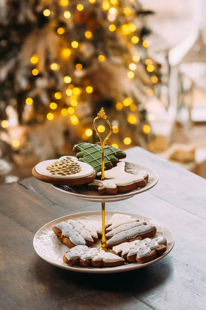 istock Christmas gingerbread on a stand on a dark table 1187645141