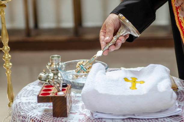 istock Holy water in Churc in baptising ritual 1187645509