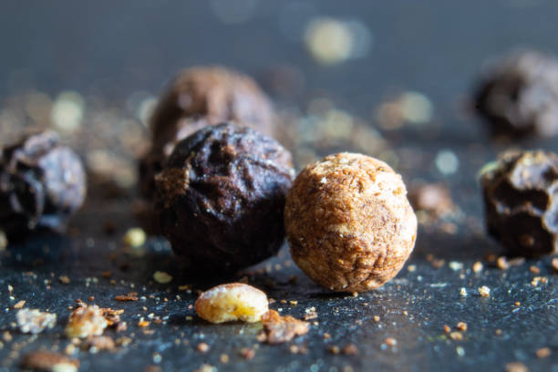 istock Macro of white pepper and black pepper 1187647045