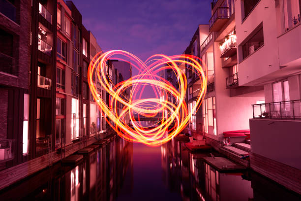 Heart shaped light painting in the city stock photo