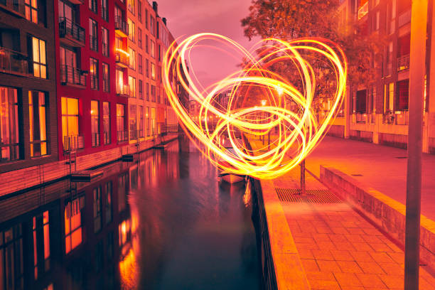 Heart shaped light painting in the city stock photo