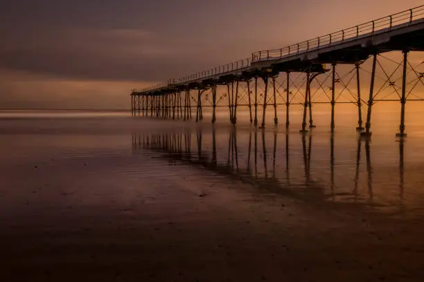Saltburn pier sunrise. Saltburn by-the-sea is a seaside town located on the north east coast of England.