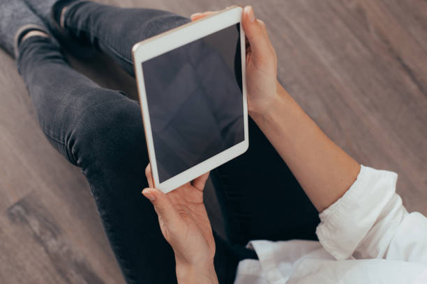 istock A picture of a young woman working on a tablet computer 1187648743