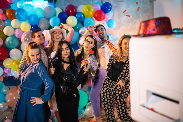 istock Going crazy in front of photo booth machine 1187651713