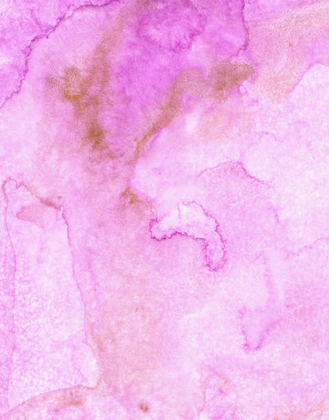 istock Watercolor hand drawn abstract pink gold background texture 1187652091
