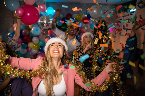 istock Happy people celebrating New Year 1187652248