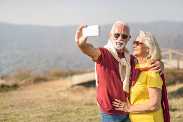 istock Senior couple taking a selfie together in nature. 1187653256
