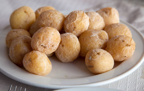 Portion of Canarian wrinkly potatoes on a white plate