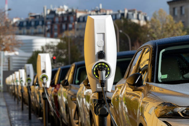 Charging points in a row on a street Paris, France - 13 November, 2019: Public charging points in a row on the street. The charging points are a popular view in European cities. carsharing photos stock pictures, royalty-free photos & images