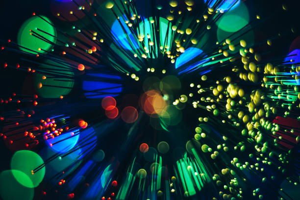 istock Beautiful multi colored optical abstract light bokeh on a dark background. 1187655121