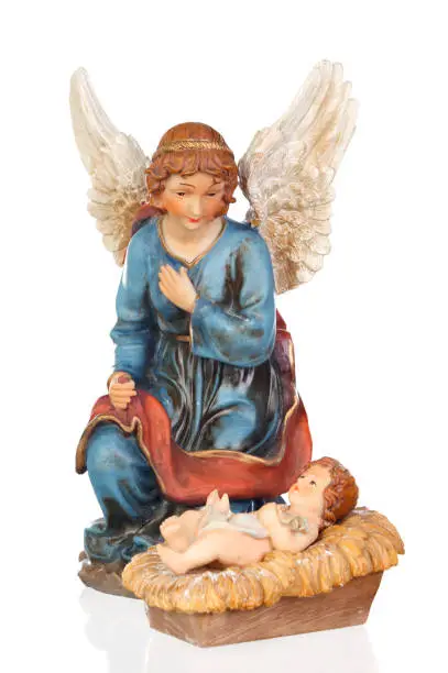 Photo of Ceramic figure of The Baby Jesus and the angel of the nativity scene
