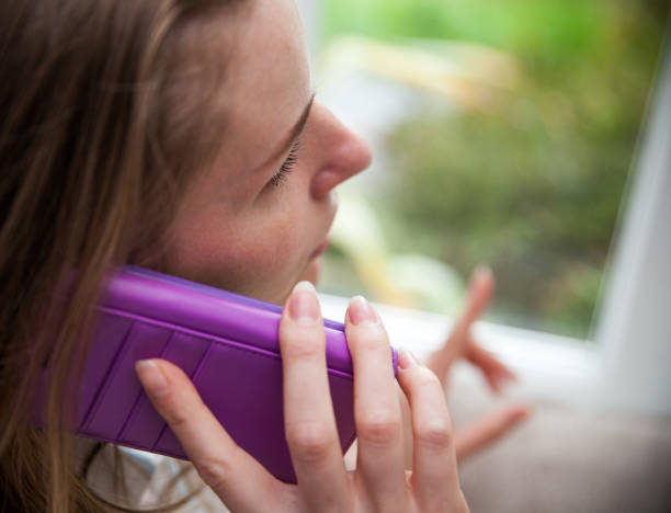 istock Woman Talking on a Mobile Telephone 1187656519