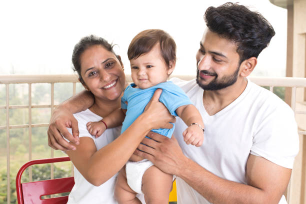 istock Loving couple and baby son 1187656852
