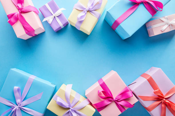 istock top view of colorful gift boxes on blue background with copy space 1187656858
