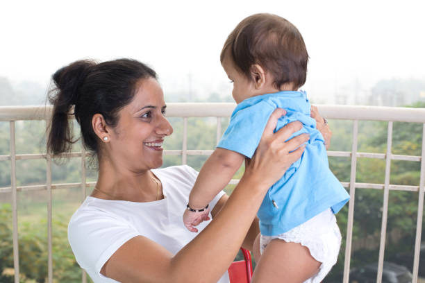 istock Loving mother and baby son 1187656928