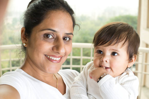 istock Loving mother and baby son 1187657232