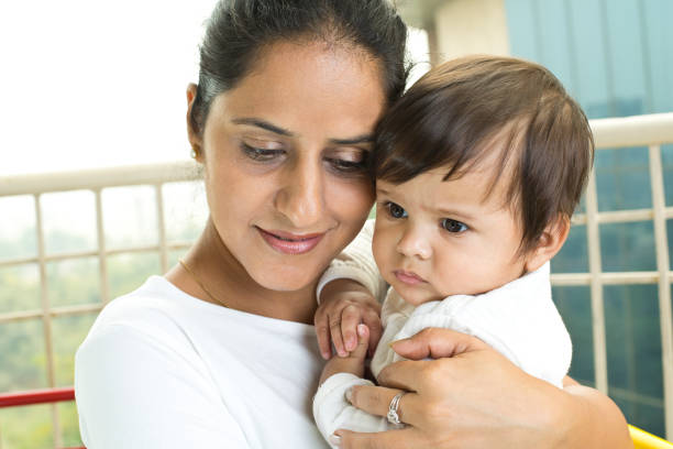 istock Loving mother and baby son 1187657266