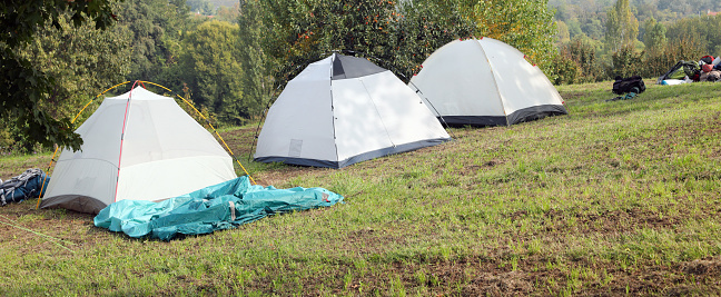 three igloo tents used by boyscouts on the camp site