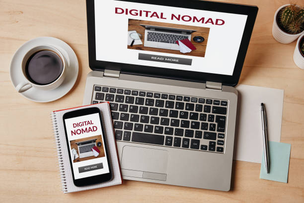 istock Digital nomad concept on laptop and smartphone screen 1187663723