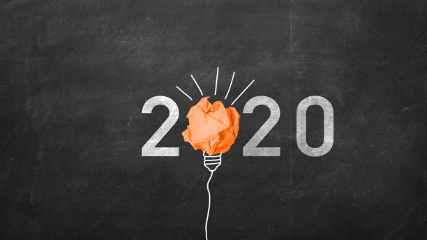 istock 2020 Orange paper light bulb, New year eco, social responsibility,innovation solution 1187665025
