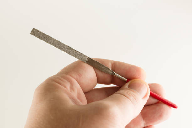 istock file with a long working part and a red dielectric handle 1187665566