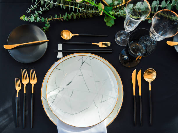 Waiting for guest,table elegance set Black and gold color Luxury table set for Wedding reception in barn porcelain photos stock pictures, royalty-free photos & images