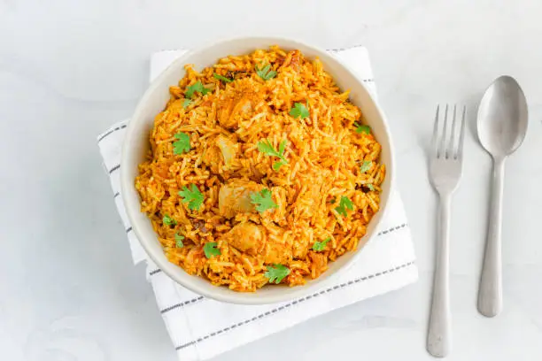 Indian Chicken Pulao, Chicken Fried Rice on White Background Top View Food Photography.