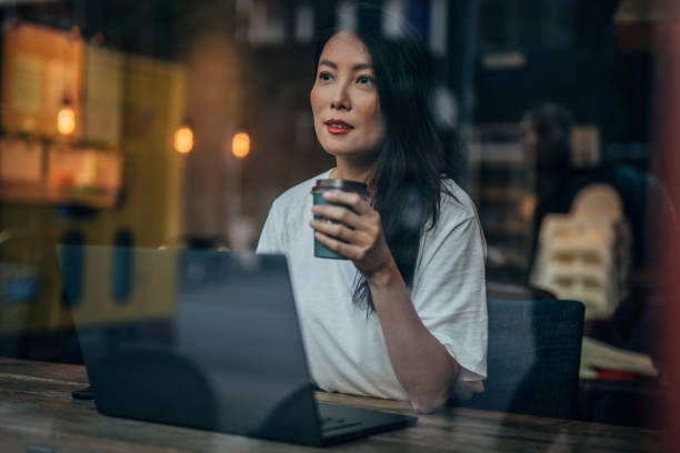 istock Pretty woman having coffee 1187667291
