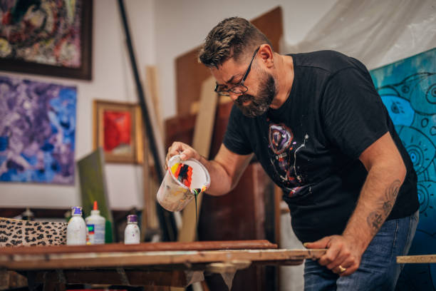 istock Male artist painting 1187668696