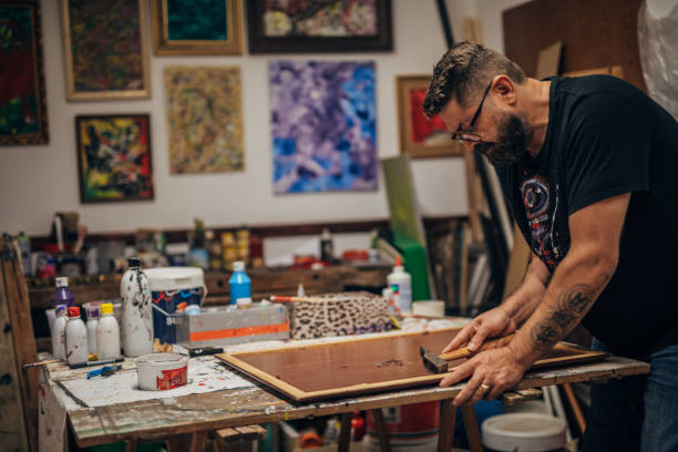 istock Artist preparing canvas for painting 1187669005