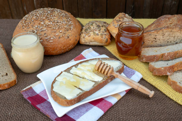 istock Slice bread with butter and honey for breakfast 1187669775
