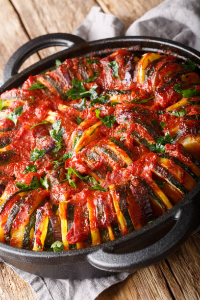 istock Greek cuisine Briam vegetable mix close-up in a pan. vertical 1187669900