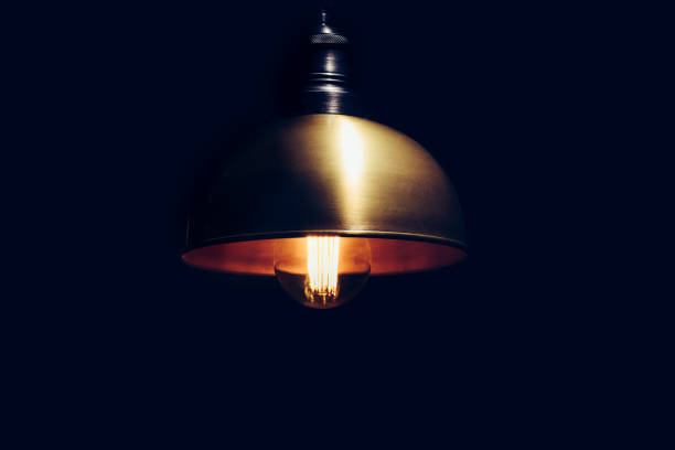 LED lamp in copper lampshade, in the dark