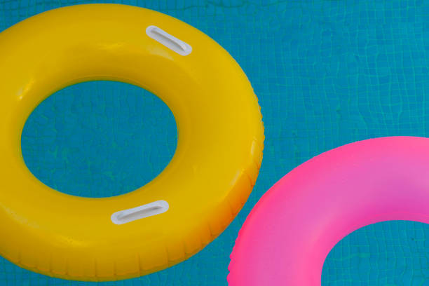 istock Colorful floats on a pool with crystal clear water 1187672477