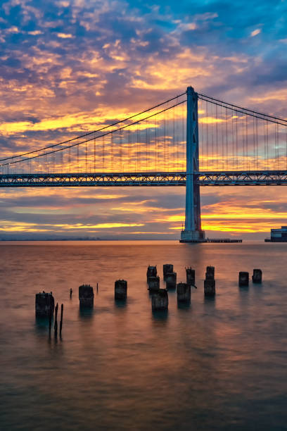 istock Fiery sunrise over San Francisco's Mid Bay Bridge 1187673384