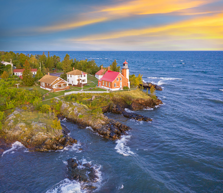 Michigan's Upper Peninsula, Eagle Harbor Lighthouse. Remote outpost at the Northern tip of the Keweenaw Peninsula in Lake Superior, amid windy autumn dawn.