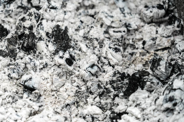 istock photo ash left after burning wood. Background 1187676674