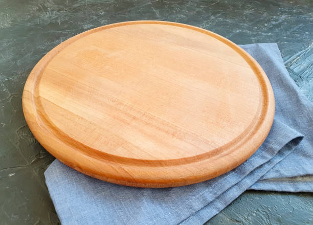 istock round wooden board, towel 1187677943