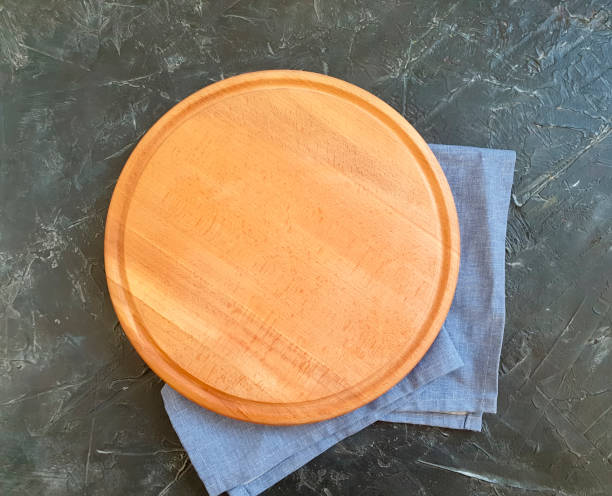 istock round wooden board, towel 1187678681