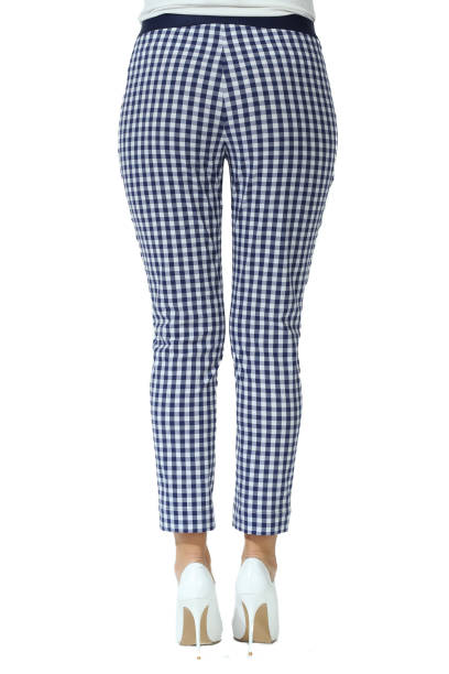 istock checked trousers with stripes on model legs with white stiletto heels 1187679108