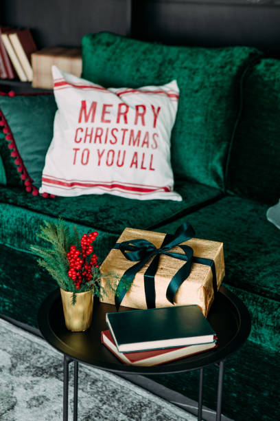 istock christmas elegant interior green sofa black style 1187680187