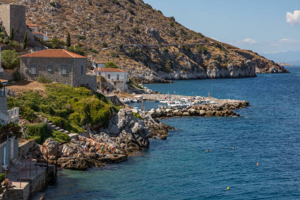 istock Buildings and Pier in Kamini beach in Hydra Island 1187681604