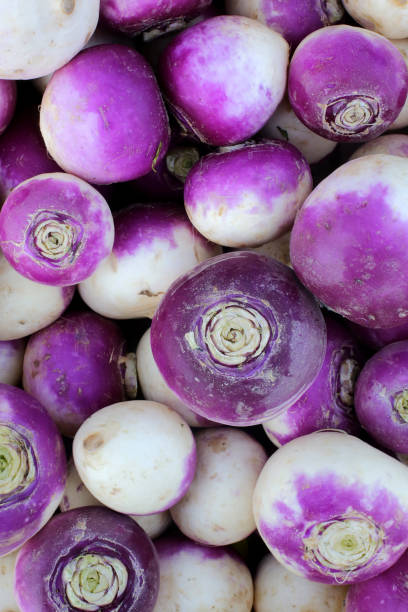 Raves. France. France. September, 18, 2019. This colorful image depicts the sale of raves on a local market. turnip stock pictures, royalty-free photos & images