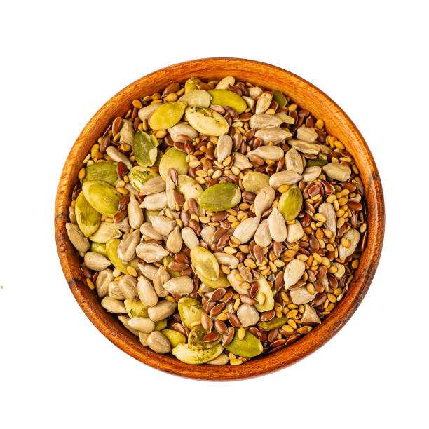 istock Bowl with mixed seeds for healthy eating on a white background 1187684448