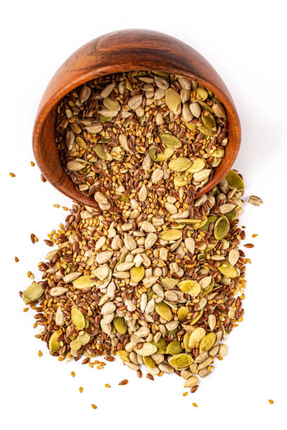 istock Bowl with mixed seeds for healthy eating on a white background 1187684488