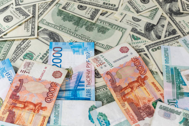 istock russian rubl and us dollar banknotes close-up with selective focus 1187686312