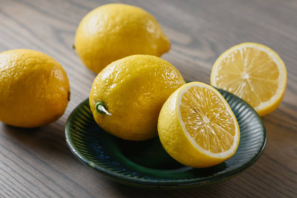 istock Lemons whole and halves. 1187686398