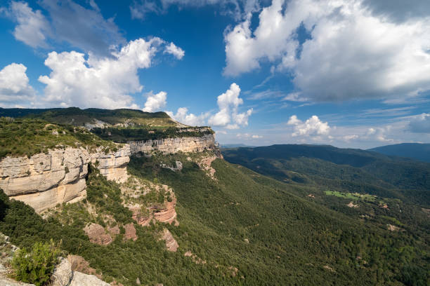 istock High rock with blue sky and green forest, Tavertet, Catalonia. 1187688934